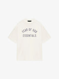 A white crewneck t-shirt with 'FEAR OF GOD ESSENTIALS' printed in dark text on the front.